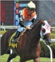  ??  ?? Jockey Drayden Van Dyke rides Chiropract­or in Race 4 Saturday at Saratoga Race Course.