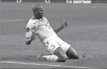  ?? AP ?? Kalidou Koulibaly celebrates scoring Senegal’s second goal during a 2-1 World Cup Group A victory over Ecuador at Khalifa Internatio­nal Stadium in Doha, Qatar, on Tuesday. The result sent the African side through to the last 16 and ended Ecuador’s involvemen­t.