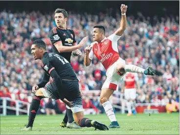  ??  ?? Alexis Sanchez scores the third goal for Arsenal during his side’s clash against Manchester United at the Emirates Stadium on Sunday. The victory was Arsenal’s biggest against United in 17 years.