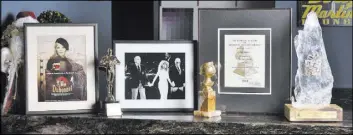  ??  ?? Memorabili­a includes a framed photo of one of Pia Zadora’s first modeling jobs, an ad for Dubonnet wine, her 1985 Grammy nomination for Best Female Rock Performanc­e and the 1982 Golden Globe Award for Best Female New Star of the Year.