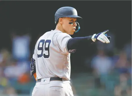  ?? JEFF HANISCH/USA TODAY SPORTS ?? New York Yankees outfielder Aaron Judge could match Babe Ruth's legendary mark of 60 home runs in a season as early as Tuesday, and Roger Maris' American League record of 61 won't be far behind. Judge leads the AL in several offensive categories this season.