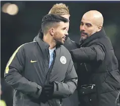  ?? — Reuters photo ?? Guardiola with Kevin De Bruyne (centre) and Sergio Aguero (left) after the match.