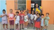  ?? ?? Mthuthuzel­i Daycare Centre principal Rina Ferrus with some of the children. Below left: The mobile clinic provides quality health care to more than 9,000 Northern Cape residents annually.