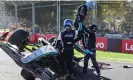  ?? Paul Crock/AFP/Getty Images ?? George Russell is helped from his car after crashing out of the final lap. Photograph: