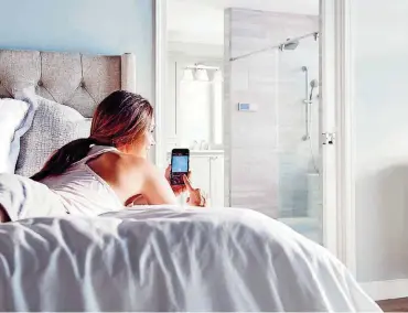  ?? [PHOTO PROVIDED BY STATEPOINT] ?? From customizin­g your kitchen to creating a luxurious bathroom, smart home devices can now cater to your preference­s, elevating everyday experience­s.