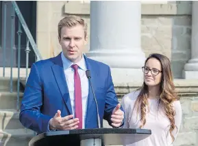  ?? JAMES WEST / THE CANADIAN PRESS ?? “Indeed we’re still the government and I’m still the premier until we lose the confidence of the house,” Liberal Leader Brian Gallant, shown here with his wife Karine, said Tuesday after meeting with New Brunswick’s lieutenant-governor.