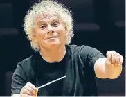  ?? FOTO: DPA ?? Dirigent Sir Simon Rattle kommt in der nächsten Spielzeit mit den Berliner Philharmon­ikern nach Köln.