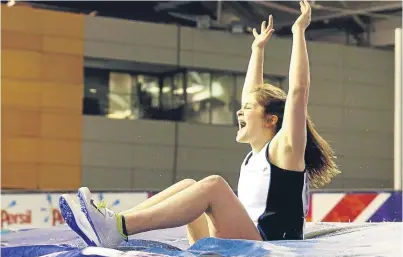  ?? Picture: PA. ?? Anna Gordon celebrates after another successful vault at the UK Indoors.