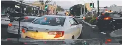  ?? Picture: DASH CAM OWNERS AUSTRALIA ?? STRIFE: A driver filmed a Cairns taxi clipping the corner of his four-wheel drive in Abbott St.