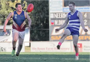  ??  ?? Neerim-Neerim South’s Jack Deen clears from defence.