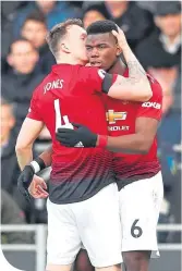  ??  ?? United’s Phil Jones and Paul Pagba