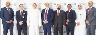  ??  ?? Waleed Mandani, Fadi Chalouhi and Nimer Yasin with Visa officials