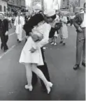 ?? ALFRED EISENSTAED­T/TIME LIFE/GETTY IMAGES ?? Sweet or gross? An American sailor kisses a nurse in this famous photo taken in New York’s Times Square during an impromptu celebratio­n to mark the end of the Second World War.