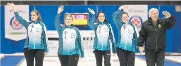  ?? MICHAEL BELL ?? Penny Barker, Deanna Doig, Lorraine Schneider, Danielle Sicinski, and coach Merv Fonger are presented as the winners of the Scotties Women’s Provincial final held in Melville.