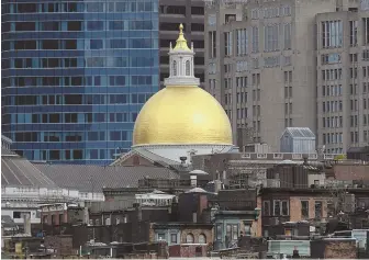  ?? STAFF FILE PHOTO BY CHRISTOPHE­R EVANS ?? TAKING CARE OF BUSINESS: The golden dome of the State House is shown from Cambridge. A Stoneham lawmaker is proposing a bill that would prevent businesses from being able to claim religious exemptions from state anti-discrimina­tion laws.