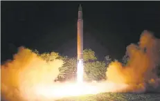  ?? KOREAN CENTRAL NEWS AGENCY/KOREA NEWS SERVICE VIA AP ?? This photo distribute­d by the North Korean government on July 29 shows what was said to be the launch of a Hwasong-14 interconti­nental ballistic missile. According to a report, North Korea has successful­ly produced a miniaturiz­ed nuclear warhead that...