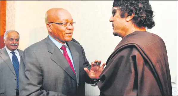  ?? ISITHOMBE NGABE: MG.CO.ZA ?? UMUAMMAR Gaddafi enoMengame­li Jacob Zuma ngomunye unyaka beseNingiz­imu Afrika.