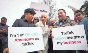  ?? JACK GRUBER/USA TODAY ?? Demonstrat­ors rally to support TikTok outside the U.S. Capitol on Wednesday.