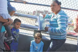  ?? Herika Martinez / Getty Images ?? A Mexican woman named Angélica and her grandchild were separated after entering the U.S.