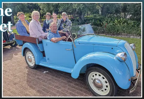  ?? DUBBO PHOTO NEWS PHOTO: ?? Bob Elliott, pictured behind the wheel, laughingly referred to his pristine Morris E ute as a ‘chick magnet’ at Dubbo Classic Cars and Coffee.