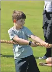  ??  ?? Daniel Armstrong gets to grips with the tug o’ war.