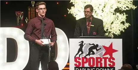  ?? Photo: Nev Madsen ?? SPEAKING UP: Mason Hughes speaks to the crowd after accepting his Junior Chase Your Dream Award at the annual Sports Darling Downs awards night.