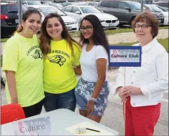  ?? JOSEPH B. NADEAU PHOTO/THE CALL ?? Members of the Lincoln High School Culture Club include, from left, Armina Parvarest Rizi, Arianne Parvaresh Rizi and Alakanada Krishnan, as well as adviser, Dorothy Lareau, a Lincoln High Spanish teacher.