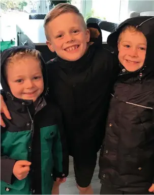  ??  ?? ●● From left, Freddie, George and Oliver Harper, who are running 10k to raise money for Manchester Children’s Hospital