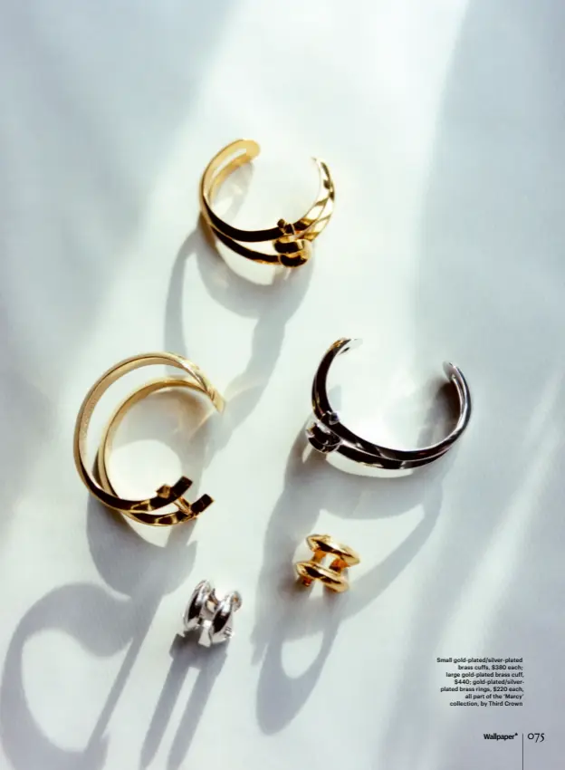  ??  ?? Small gold-plated/silver-plated brass cuffs, $380 each; large gold-plated brass cuff, $440; gold-plated/silverplat­ed brass rings, $220 each, all part of the ‘Marcy’ collection, by Third Crown