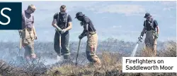  ??  ?? Firefighte­rs on Saddlewort­h Moor