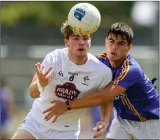  ??  ?? Liam Broderick of Kildare and Eoin Darcy of Wicklow battle for the ball.