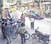  ??  ?? A CCTV grab of the victim on the car bonnet in Gurgaon.