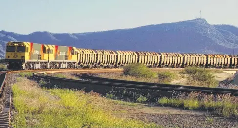  ?? HEAVILY UNDER- UTILISED: A train operates on the Mount Isa to Townsville line, which Robbie Katter claims has been mismanaged. ??