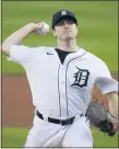  ?? PAUL SANCYA — THE ASSOCIATED PRESS ?? Detroit Tigers pitcher Casey Mize throws against the Cleveland Indians during the game in Detroit, Thursday. At press time, Cleveland led Detroit, 10-3. For full coverage of the game and more sports news, go to our website at TheOakland­Press.com/sports.