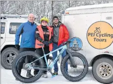  ?? DESIREE ANSTEY/ JOURNAL PIONEER ?? Chris LeClair of Quest Carbon (a new company that makes custom carbon winter bikes), Cynthia King of P.E.I. Cycling Tours and Geoff Murray, the P.E.I. Bike Guy (a profession­al bicycle mechanic), were doing demonstrat­ions on their fattire bikes. “Quest Carbon is a brand-new company that was just launched, so we are here today demonstrat­ing our bikes because the three of us partnered in the launch,” said King.