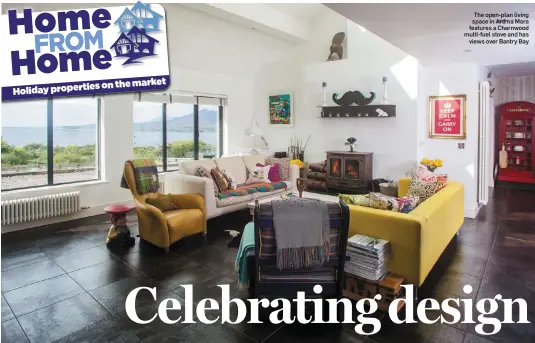  ??  ?? The open-plan living space in Ard na Mara features a Charnwood multi-fuel stove and has views over Bantry Bay