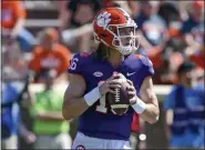  ?? RICHARD SHIRO — THE ASSOCIATED PRESS ?? FILE - In this April 6, 2019, file photo, Clemson’s Trevor Lawrence drops back to pass during Clemson’s annual Orange and White spring scrimmage in Clemson, S.C.