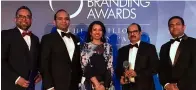  ?? — Supplied photo ?? Ashraf Ali MA, executive Director of lulu Group, along with Adeeb Ahamed, MD of lulu Financial Group, shafeena Yusuffali, CeO of tablez, Mohammed Althaf, Director, and V. nandakumar, CCO of lulu Group, with the brand of the Year trophy at the world branding Award ceremony in london.