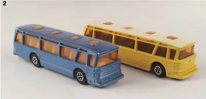  ??  ?? 2 2 Dinky Toys Duple Viceroy 37 Luxury Coach (No 296) variations in metallic blue and yellow.