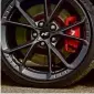  ?? ?? WHEELS
Forged 19-inch alloy wheels are 14.4kg lighter than the cast wheels used by earlier i30 N models. Red brake calipers grip front discs that, at 360mm, are slightly smaller than the Ford’s
