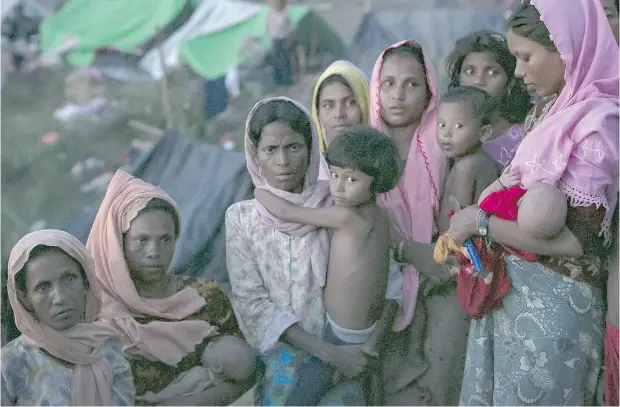  ?? ALLISON JOYCE / GETTY IMAGES ?? Rohingya Muslims in a camp in Cox’s Bazar, Bangladesh. Nearly 400,000 Rohingya refugees have fled the atrocities in Myanmar.