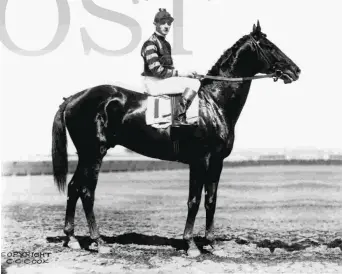  ?? KEENELAND LIBRARY/COOK COLLECTION ?? Man o’ War with jockey Clarence Kummer in 1920. A hundred years after his birth, he remains the benchmark by which all great Thoroughbr­eds are judged.