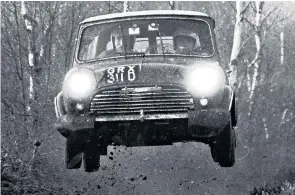  ??  ?? Makinen takes to the air in an Austin Morris Mini and (right) in 1971: he honed his talents on the snow, ice and gravel of local roads