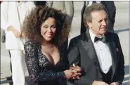  ?? DOUG PIZAC, FILE - THE ASSOCIATED PRESS ?? This 1986 file photo shows singers Vic Damone, right, and Diahann Carroll at the Emmy awards in Los Angeles. Carroll died, Friday, at her home in Los Angeles after a long bout with cancer. She was 84.