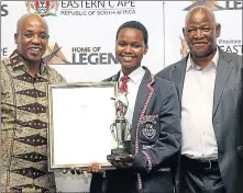  ??  ?? BRIGHTEST STAR: Uviwe Mbombela of GHS, centre, the top 2015 matric student in the Queenstown area, receives her award from Eastern Cape education department MEC Mandla Makupula and Eastern Cape premier, Phumulo Masuale Picture: MARK ANDREWS@DAILY...