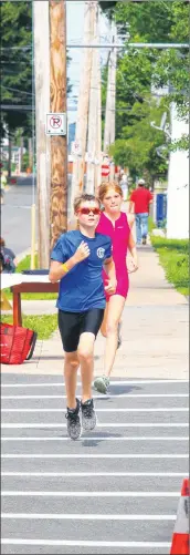  ?? CONTRIBUTE­D ?? About 80 youths aged three to 16 years competed Aug. 12 in a fun triathlon in Windsor.