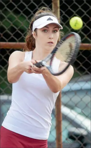 ?? PHOTOS BY TANIA BARRICKLO — DAILY FREEMAN ?? Raquelle DeCicco earned a win at third singles during Kingston’s victory over Newburgh.