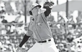  ?? JONATHAN DYER/USA TODAY SPORTS ?? The Rays’ Tyler Glasnow was pounding the strike zone and consistent­ly hitting 97, 98 and 99 mph on the scoreboard radar last week.