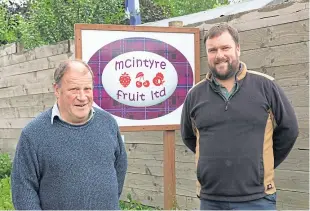  ??  ?? Euan Mcintyre and his son Matt at Wester Essendy farm, Blairgowri­e.