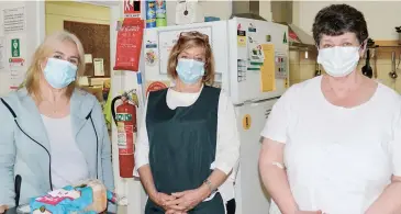  ??  ?? There are plenty of volunteers at the centre helping, with (from left) president Belinda Forrest, Anne Burns and coordinato­r Pauline Ward helping many throughout the lockdown.